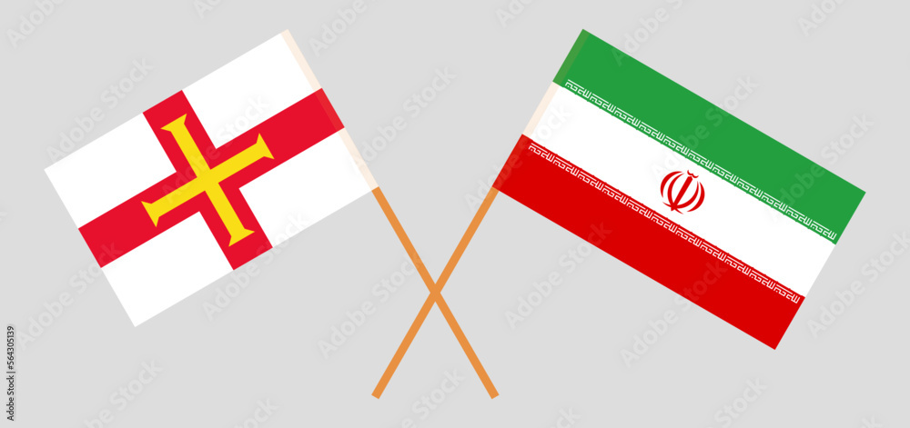 Crossed flags of Bailiwick of Guernsey and Iran. Official colors. Correct proportion