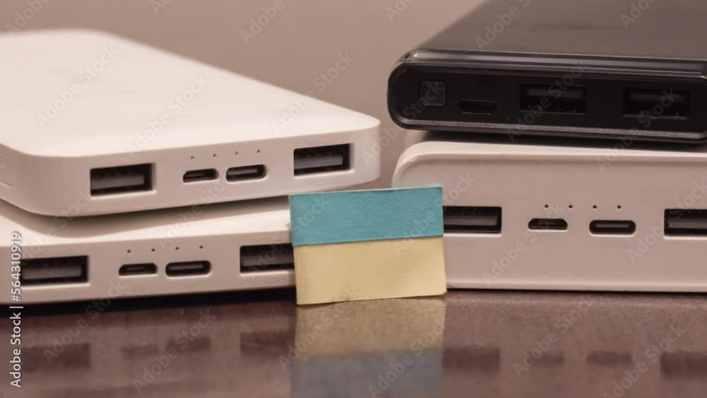 Power banks with the Ukrainian flag. Blackout due to war in Ukraine Power banks with the Ukrainian flag. Blackout due to war in Ukraine