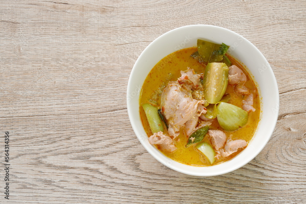 spicy boiled slice chicken and eggplant in coconut milk red curry soup on bowl spicy boiled slice chicken and eggplant in coconut milk red curry soup on bowl