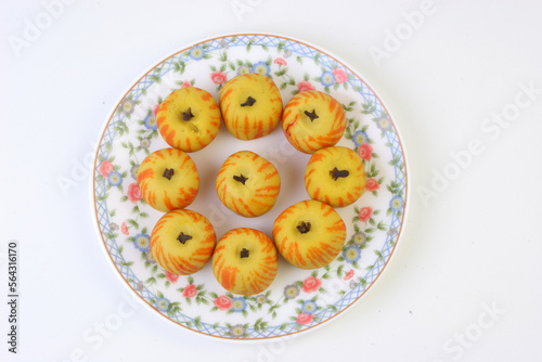 Juicy sweets of India on a decorative plate photo