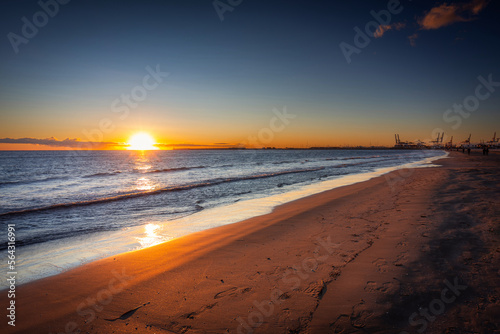 Playa de las Arenas beach by the Mediterranean Sea in Valencia at sunrise. Spain