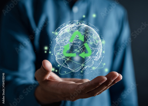 Man holding recycle symbol icon eco and save the earth  good atmosphere  save the planet and energy concept..