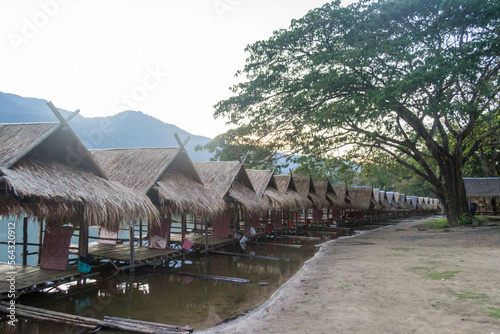 Straw floating huts on the water at Huay Tueng Thao Reservoir in Chiang Mai, Thailand.