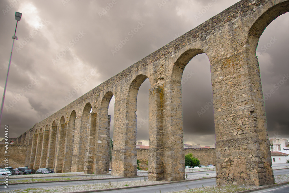 Old aqueduct in the pretty town of Évora in Portugal