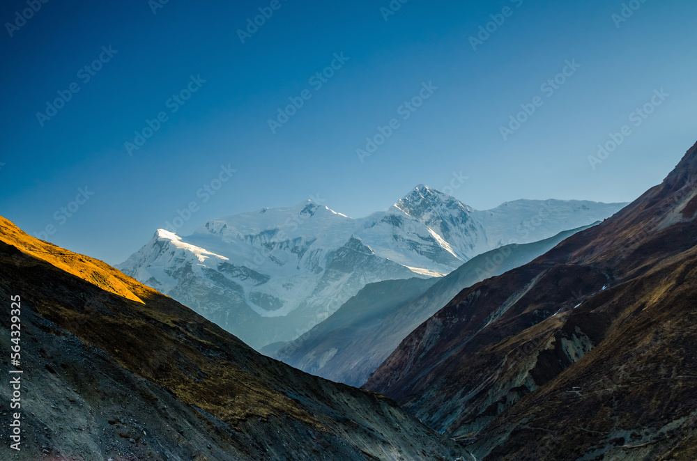 Mt. Gangapurna at sunset. View from Thorung Phedi. Annapurna circuit trek, Nepal.