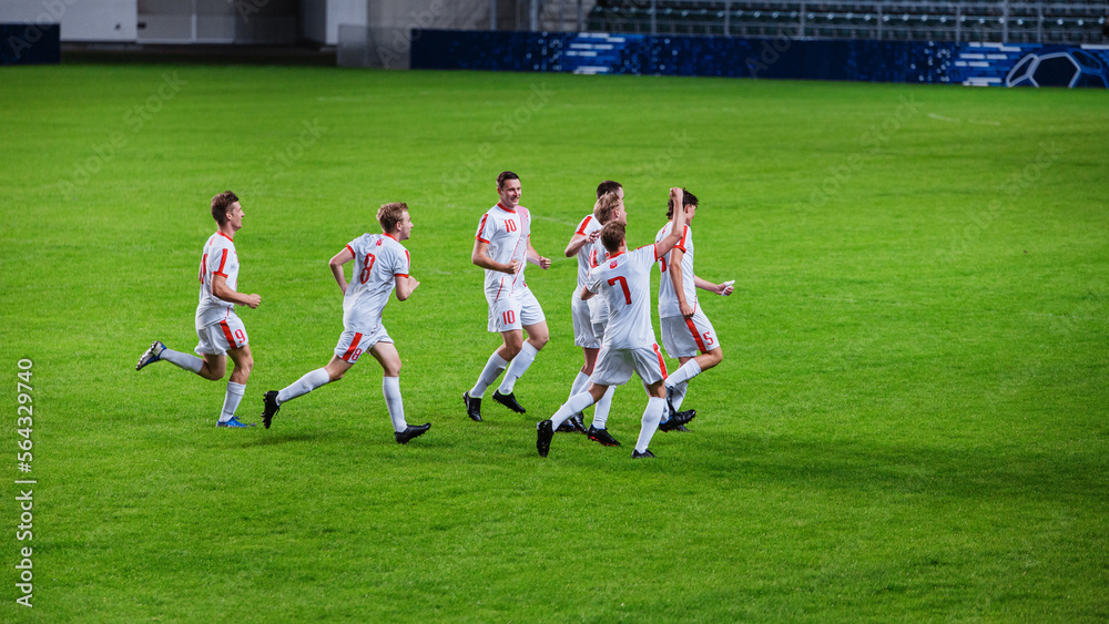 Soccer Football Championship Final Match: White Team Players Happy and Celebrate Victory, Hug after Winning Major League Sport Event. Television Broadcast Channel Concept.