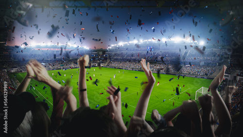 Fotografie Establishing Shot of Fans Cheer for Their Team on a Stadium During Soccer Championship Match