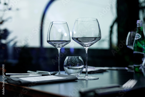 Empty wine glass on the table before banquet.