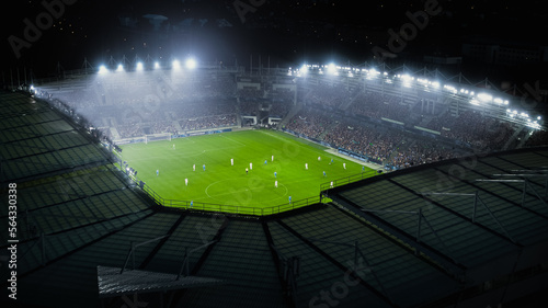 Aerial Establishing Shot of a Whole Stadium with Soccer Championship Match. Teams Play, Crowd of Fans Cheer. Football Tournament, Cup Broadcast. Sport Channel Television, Screen Content. photo