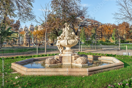 Fountain Font dels Nens by Josep Reynes i Gurgui, 1893, in Parc de la Ciutadella in Barcelona, Spain. Ancient Vase with children or Gerro amb nens sculpture inside the water pool on a sunny autumn day photo