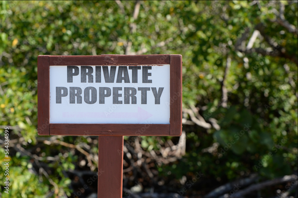 An image of an old private property sign 