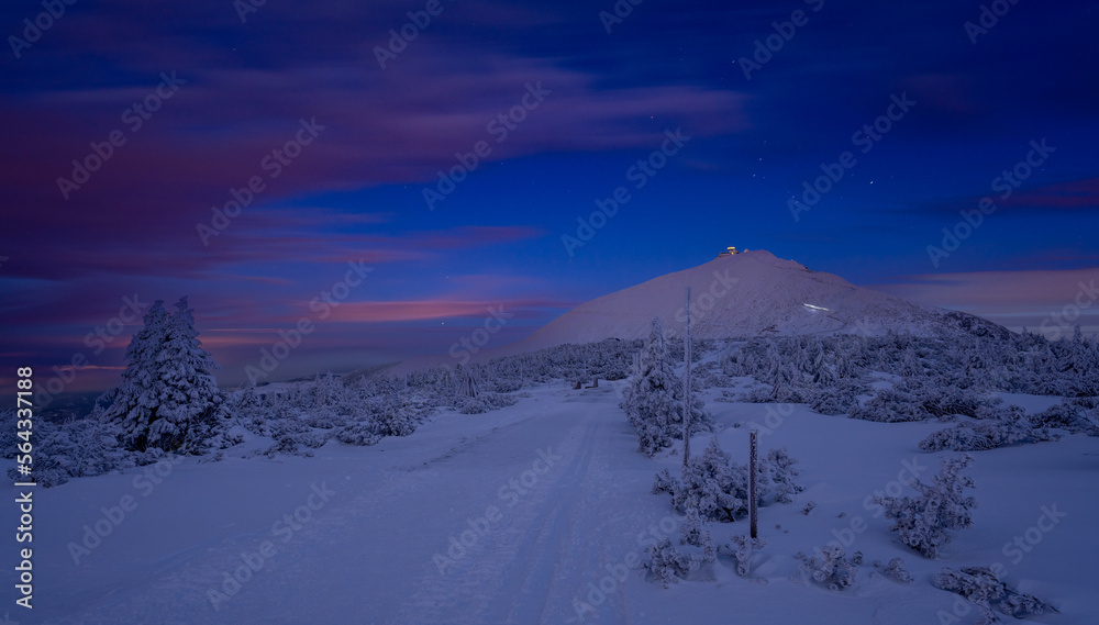 trail in Karkonosze mountains with Sniezka view during dusk in Poland