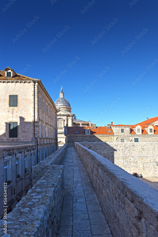 Walk on the ancient, defensive city wall in Dubrovnik, Croatia at the Dalmatian Coast of the Adriatic Sea