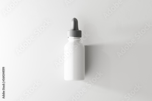 white plastic dropper bottle mockup