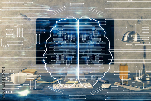 Double exposure of table with computer and brain hologram. Data innovation concept.