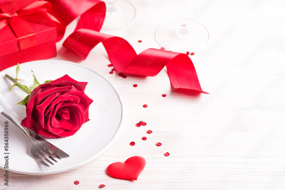 Valentines day table setting with red rose