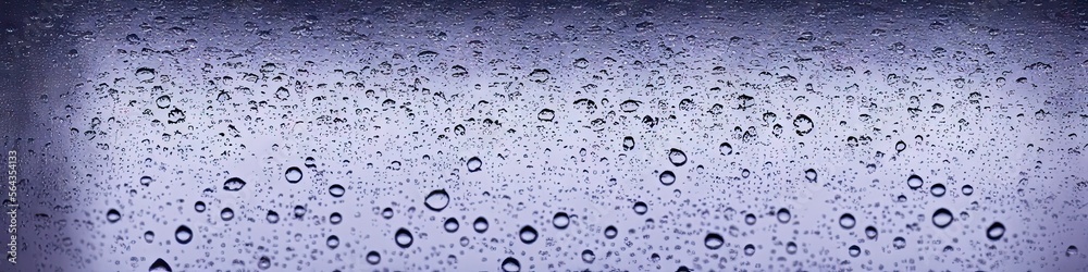 Raindrops on glass - panoramic photorealistic image with 3D shading created by generative AI for web banners Raindrops on glass - panoramic photorealistic image with 3D shading created by generative AI for web banners