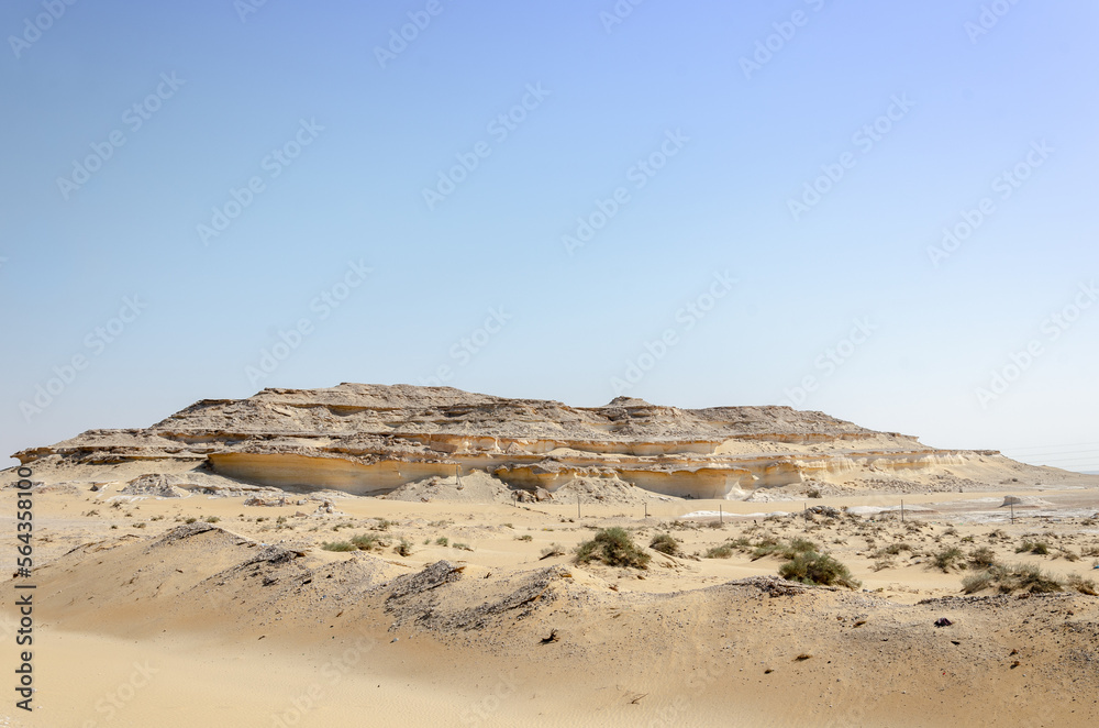 Desert landscape with limestone hillocks in the background