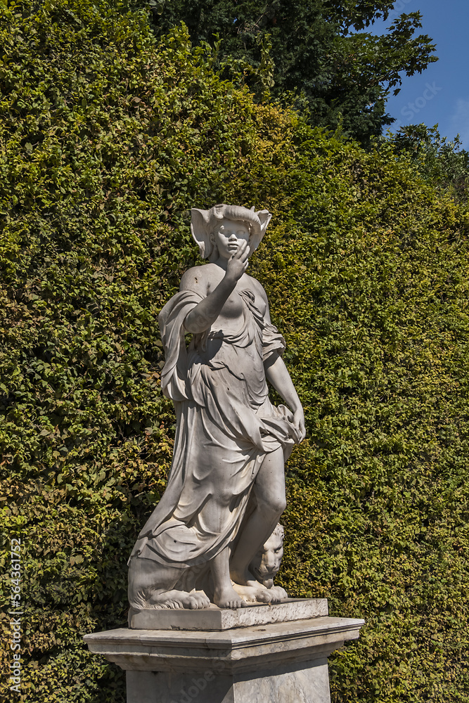 Antique sculpture in Gardens of Versailles palace. Versailles, France.