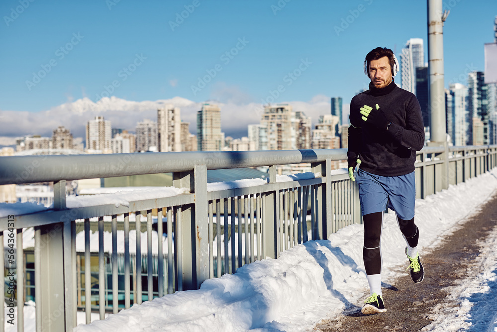 custom made wallpaper toronto digitalFull length of athlete running over bridge on winter day.