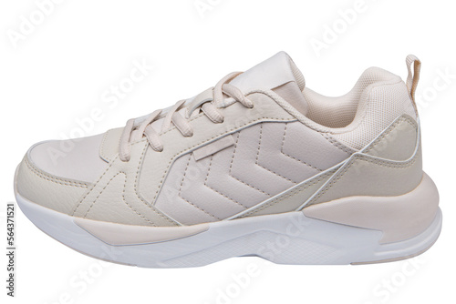 Leather beige sports shoes for casual walks and for running, on a white background, isolate