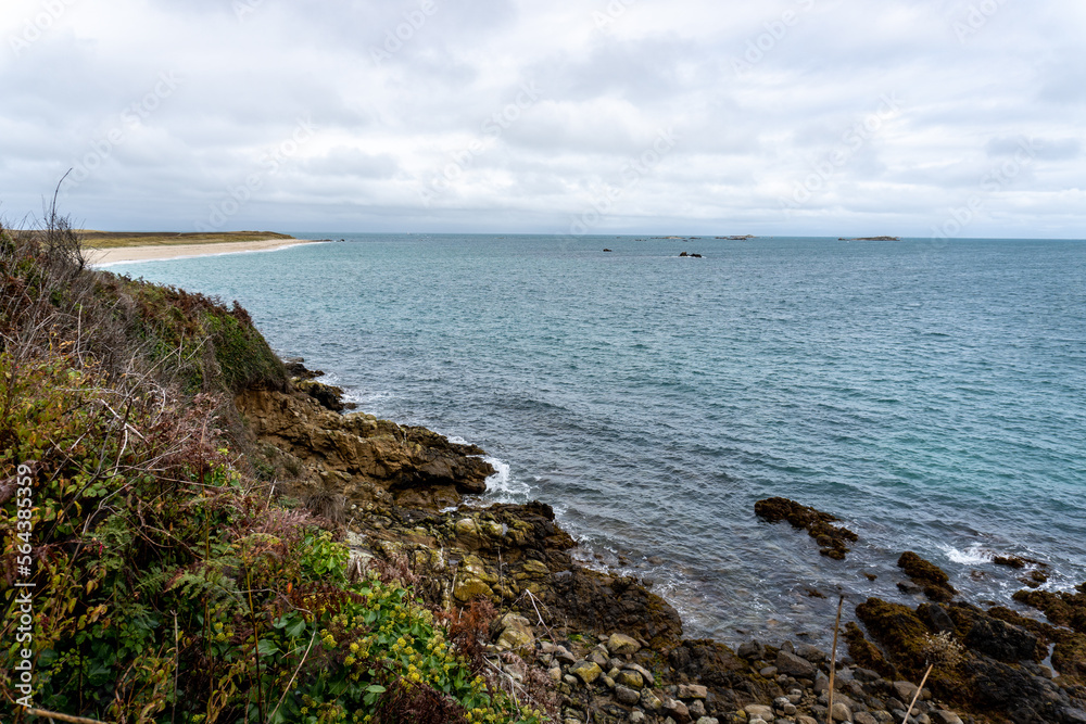 Herm Island, Channel Island in Bailiwick of Guernsey. Car free island is popular British Isles holiday destination. Cliffs and shell beach. Herm Island, Channel Island in Bailiwick of Guernsey. Car free island is popular British Isles holiday destination. Cliffs and shell beach.