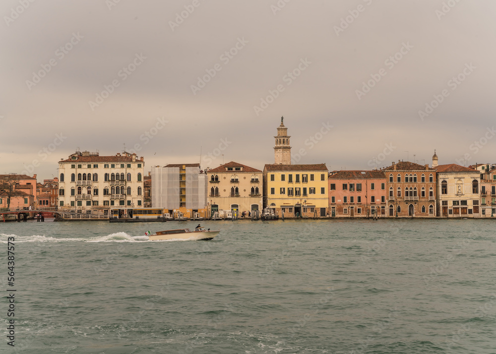 colorful buildings in Venice, Italy seen from the lagoon