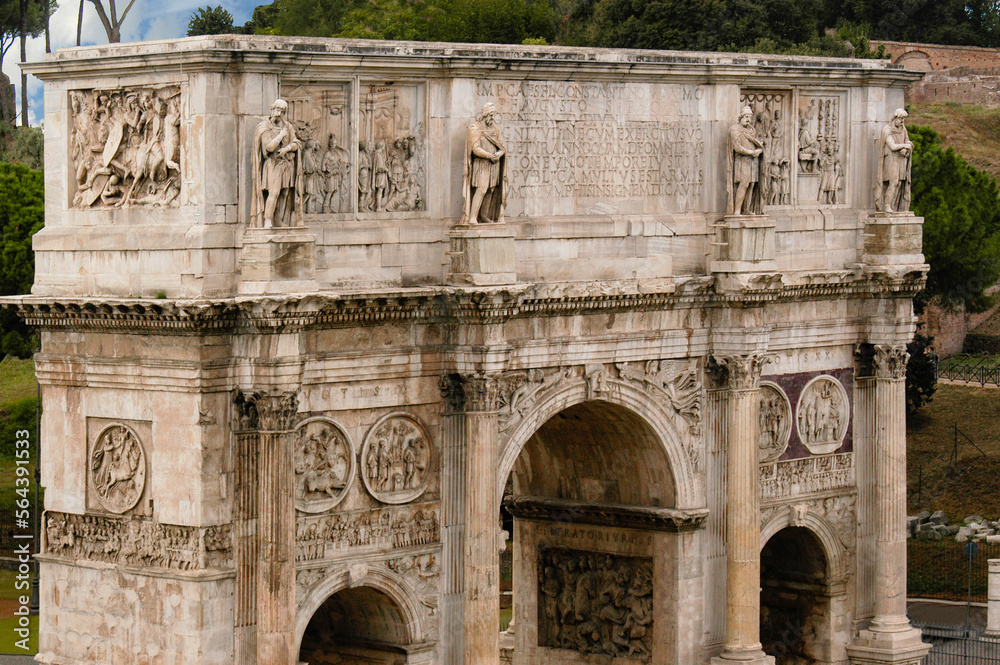 Arch of Constantine carved on blocks of marble next to the Colosseum in Rome, Italy