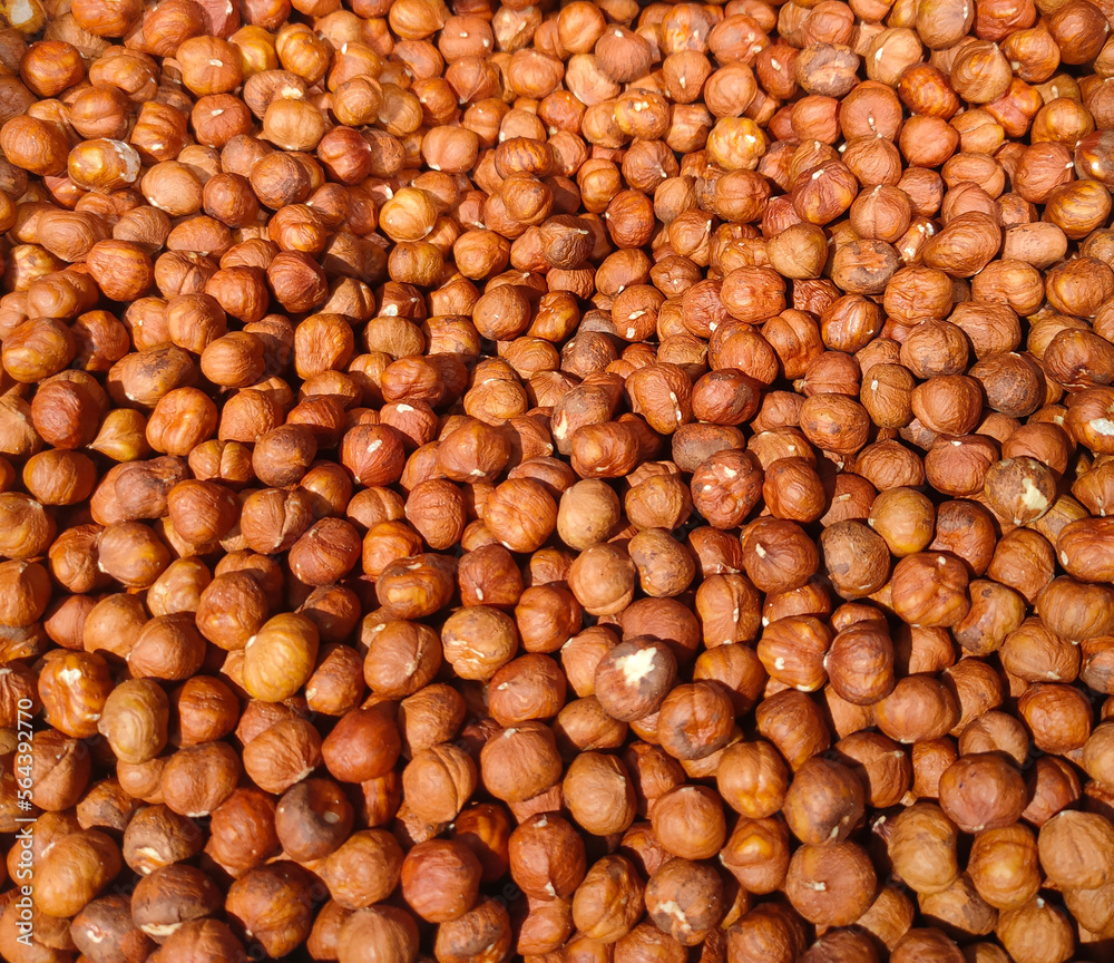 a lot of peeled hazelnuts on the supermarket counter a lot of peeled hazelnuts on the supermarket counter