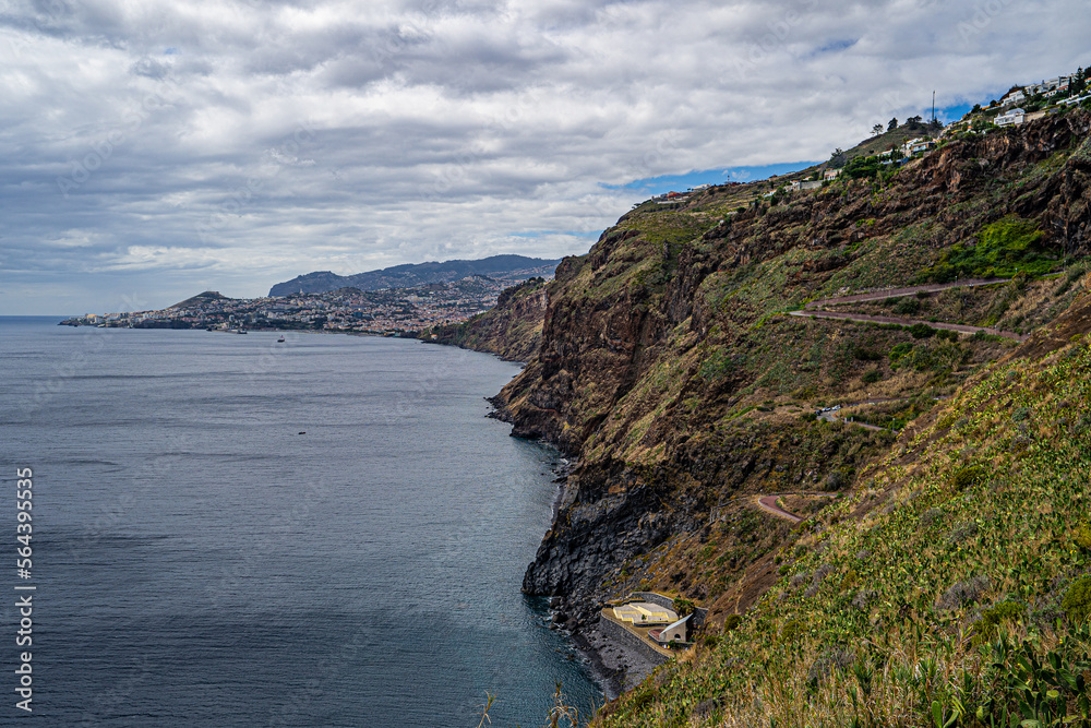 Traditional rocky coast of the Atlantic Ocean in Funchal.