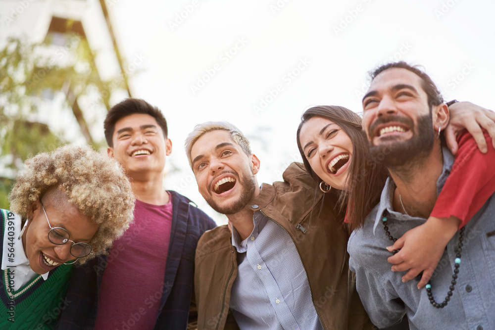 Three couples having fun piggybacking at sundown. High quality photo