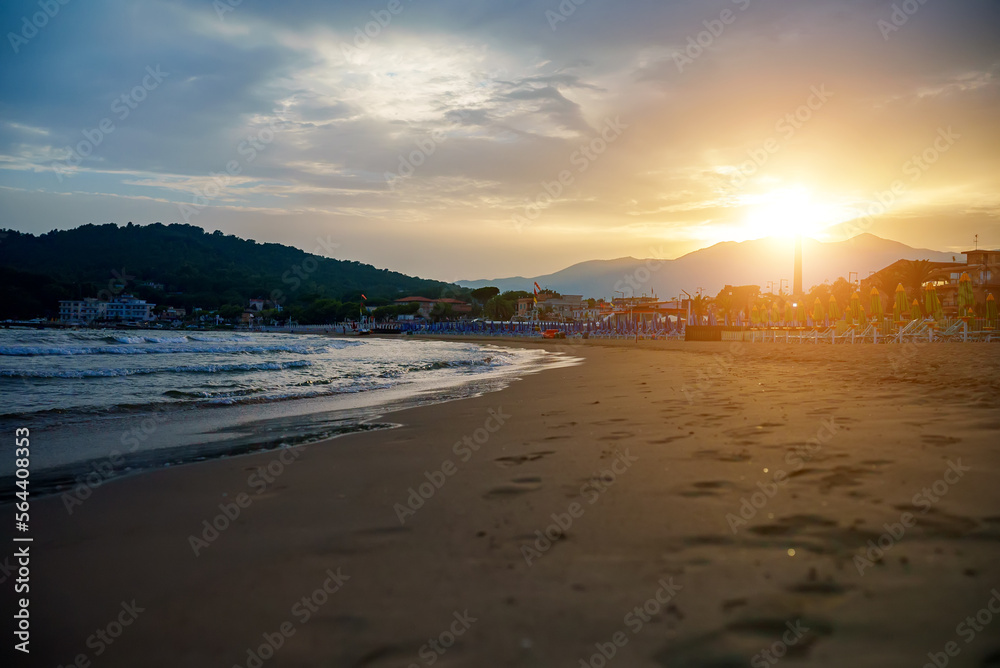 Beautiful sunset on the beach in Scauri, Italy.