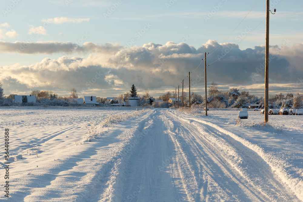 Country road after a snowstorm covered with snow Country road after a snowstorm covered with snow