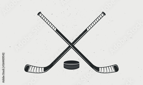 Ice Hockey icon, label, badge, logo template. Hockey sticks, cues with puck isolated on white background. Vector illustration.