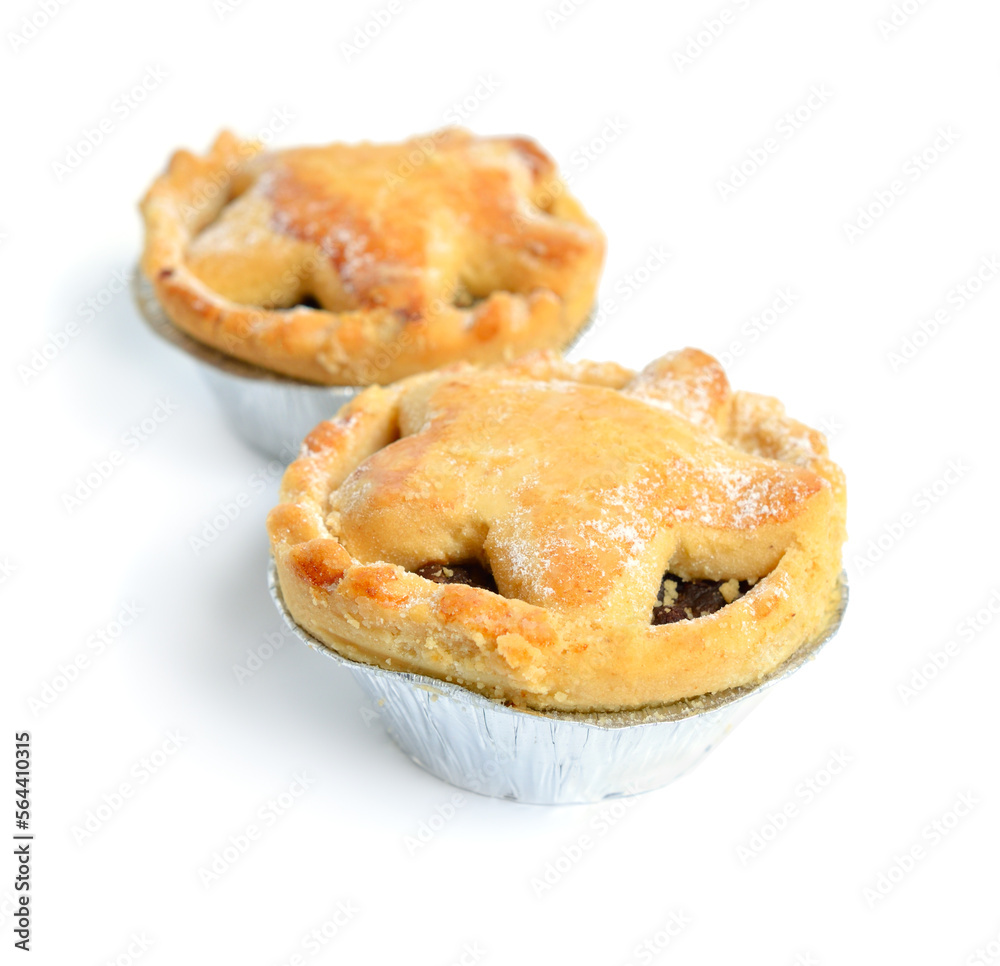 Cranberry and chocolate mince pies isolated on white background Cranberry and chocolate mince pies isolated on white background