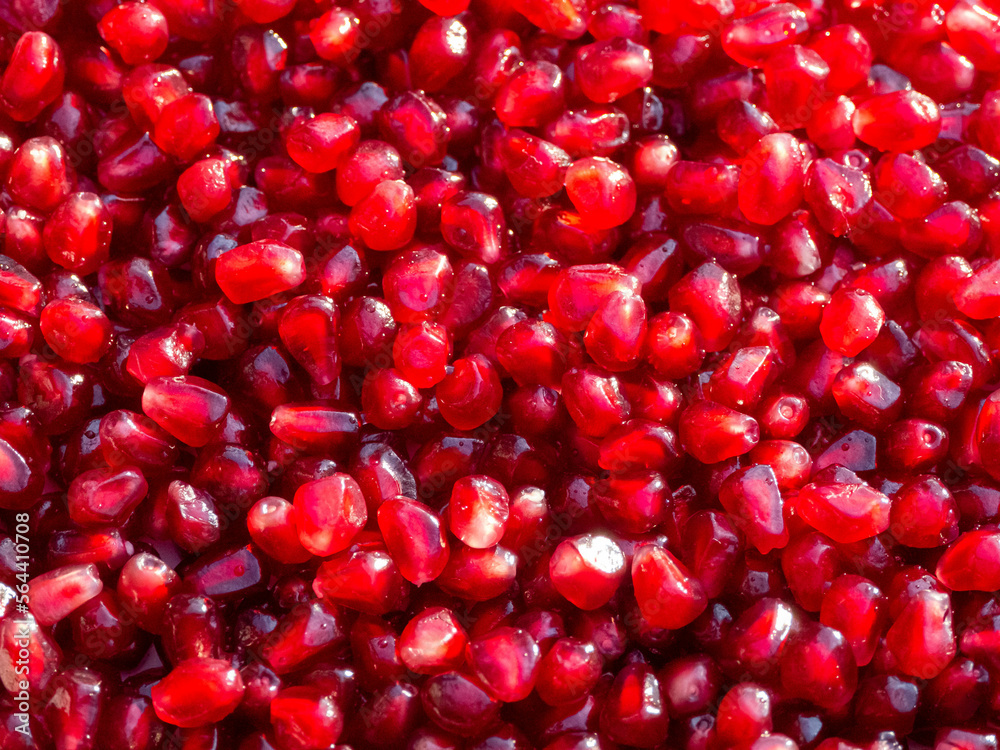Refreshing pomegranate background. Color 2023 Viva Magenta. Refreshing pomegranate background. Color 2023 Viva Magenta.