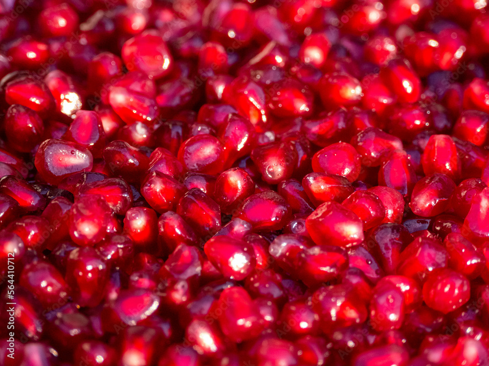 Refreshing pomegranate background. Color 2023 Viva Magenta. Refreshing pomegranate background. Color 2023 Viva Magenta.