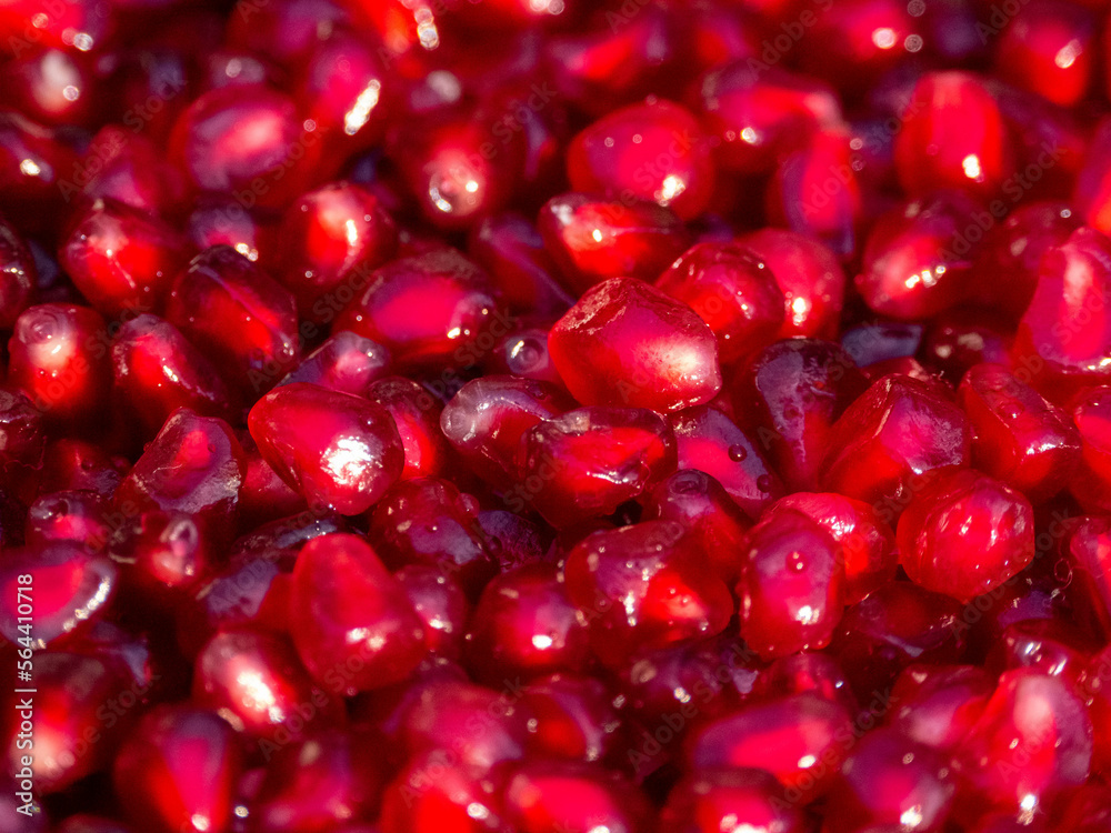 Refreshing pomegranate background. Color 2023 Viva Magenta. Refreshing pomegranate background. Color 2023 Viva Magenta.