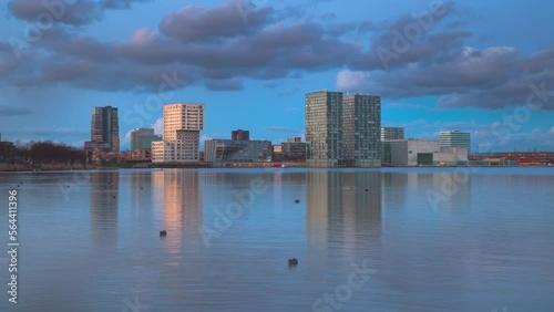 4K Time-lapse video, city skyline of lakeside at sunset, Almere, Flevoland, Netherlands photo