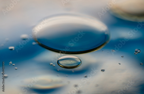 Abstract colorful bubbles. Soft background with blue tones selective focus
