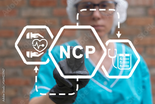 NCP Nursing Care Plan Medical Concept. Nurse using virtual touchscreen presses abbreviation: NCP. Long-term care. photo