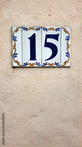 number fifteen on a wall