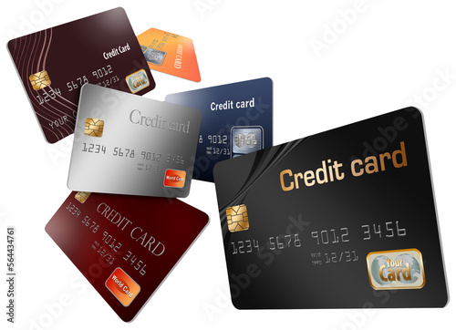 Here are generic, mock (safe to publish)  credit cards in a group that seem to be floating and flying across the page. photo