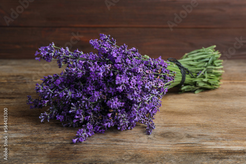 Fototapeta Naklejka Na Ścianę i Meble -  Beautiful fresh lavender bouquet on wooden table