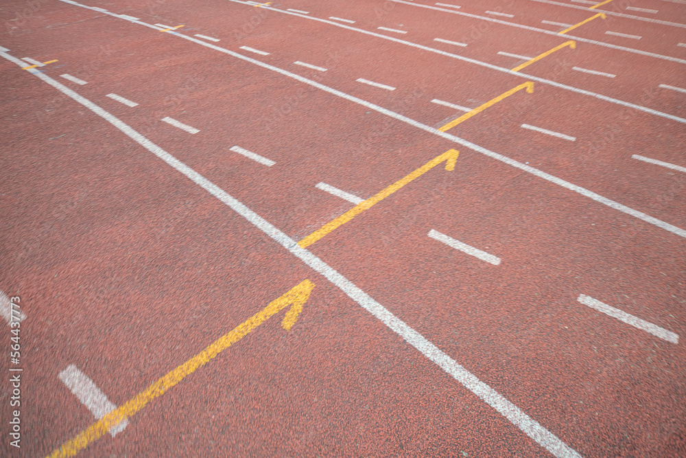 Empty fast running lane in outdoor sport stadium