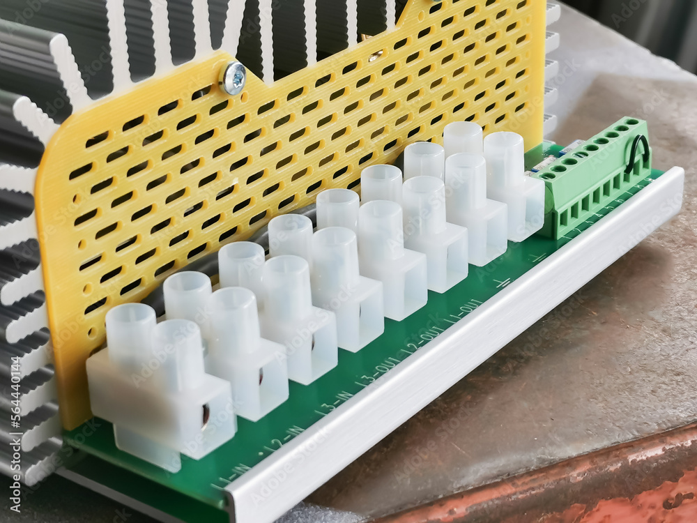Selective focus image of electric heating controller in electrical panel. Selective focus image of electric heating controller in electrical panel.