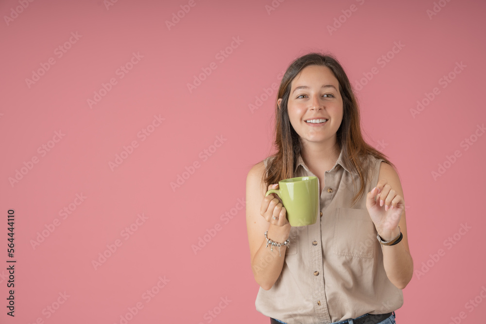 Thoughtful and happy young lady sipping a cup of coffee Thoughtful and happy young lady sipping a cup of coffee