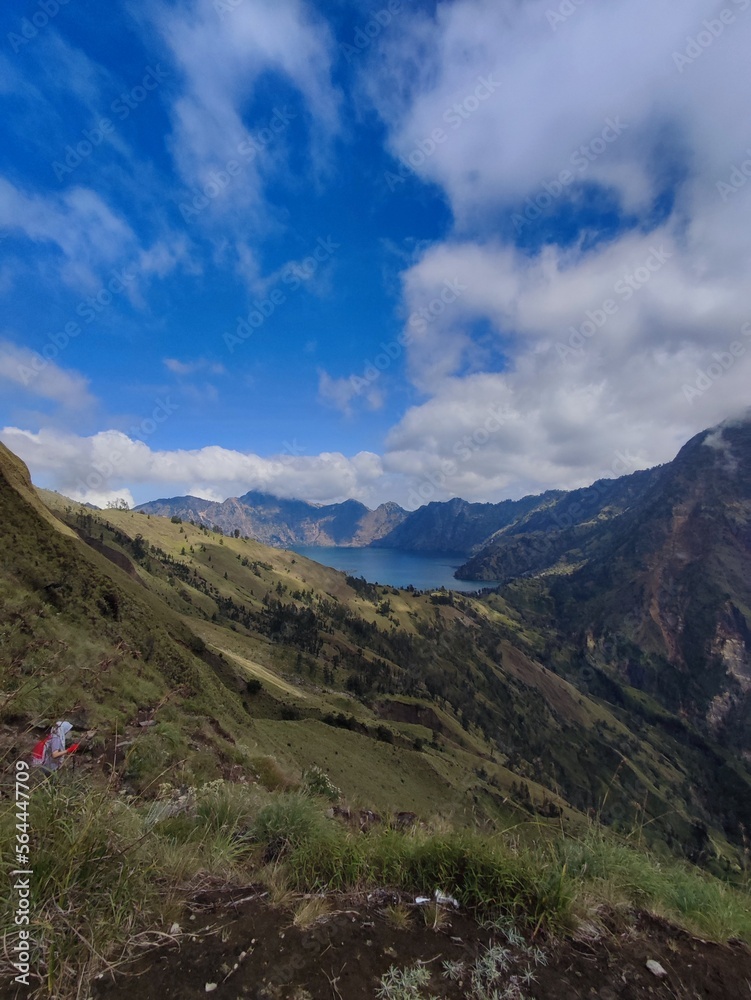 landscape with lake on top of mount rinjani