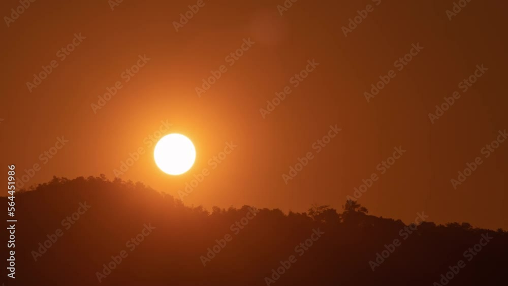 Timelapse of dramatic sunrise with orange sky in a sunny day. Timelapse of dramatic sunrise with orange sky in a sunny day.