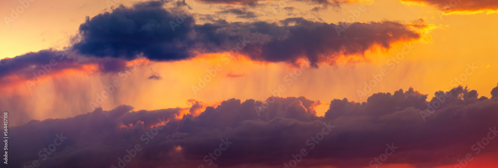 Summer sunset. Storm clouds on the background of the orange sky. Summer sunset. Storm clouds on the background of the orange sky.